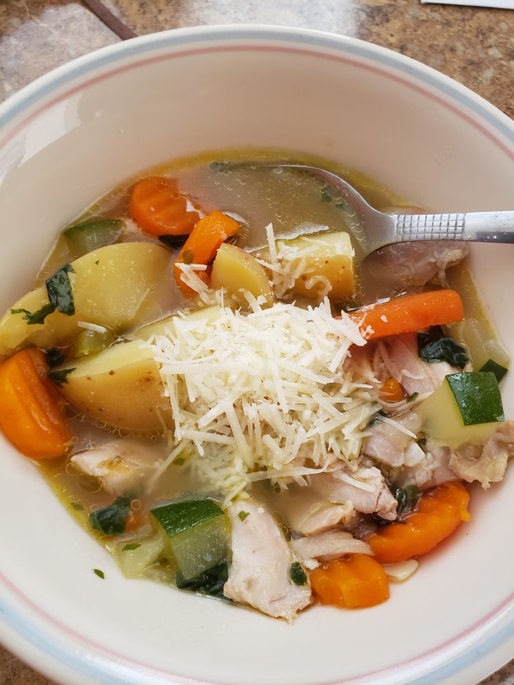 Crock Pot Chicken Stew is a hearty slow cooker dinner recipe that includes chicken, russet potatoes, peeled and sliced carrots, and diced onions, all cooked in a chicken soup. 